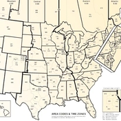 AT&T develops a telephone numbering scheme that encompasses 20 North American countries to facilitate direct dialing with ten-digit numbers, with a three-digit area code followed by a seven-digit local number.